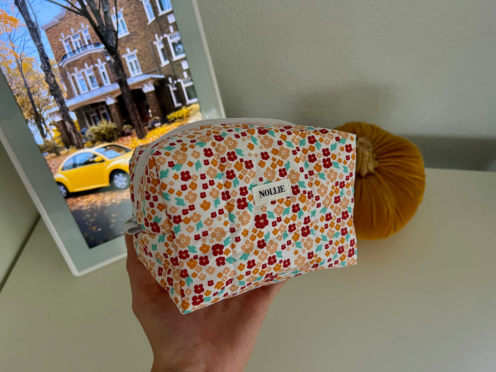 Orange Flowerheads Makeup Bag