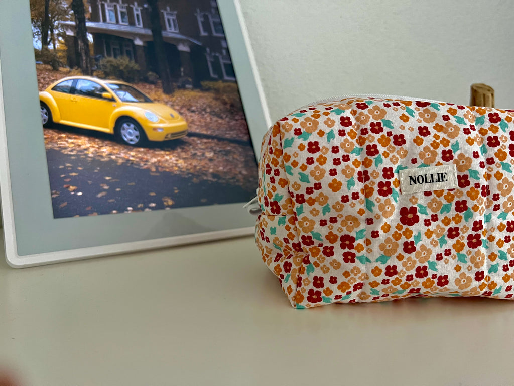 Orange Flowerheads Makeup Bag