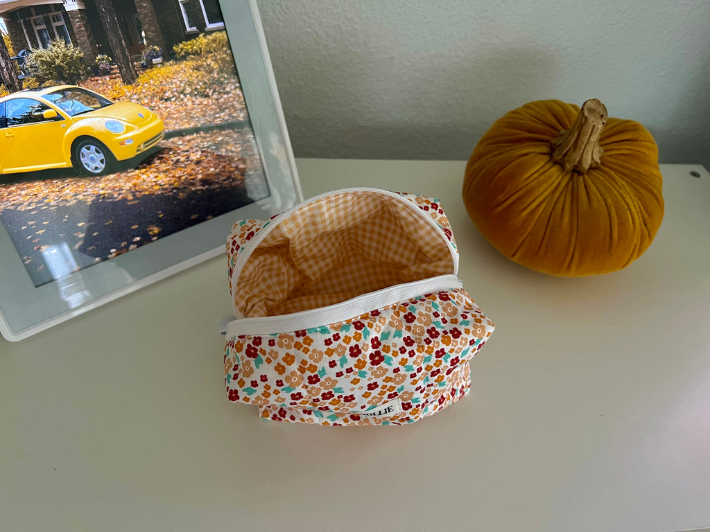 Orange Flowerheads Makeup Bag
