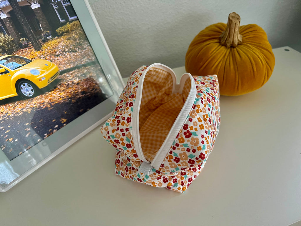 Orange Flowerheads Makeup Bag
